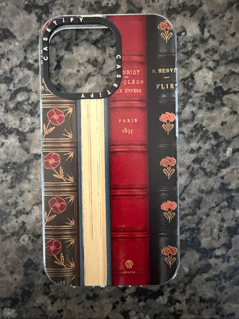 Casetify Red and Black Vintage Book Spine iPhone 13 Pro Case